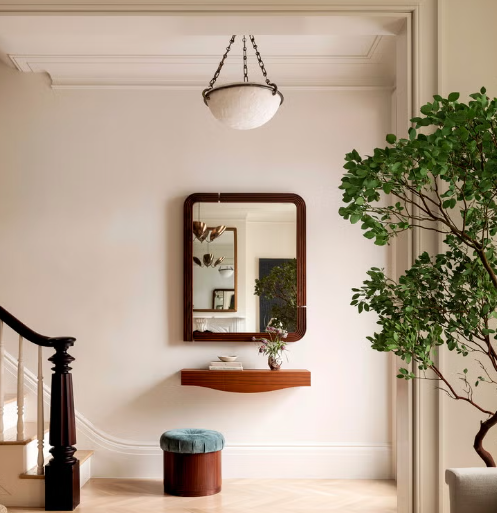 Warm Entryway Ideas with Earth-Tone Art