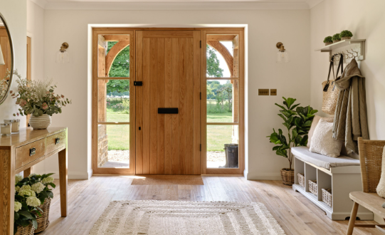 Cozy Entryway Decor with Warm Metallic Details