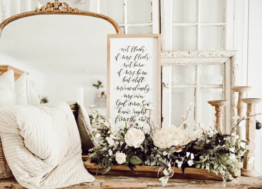 Cozy Entryway Decor Using Layered Wall Art