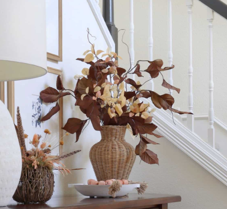 Cozy Entryway Decor Using Clay Vases and Warm Florals